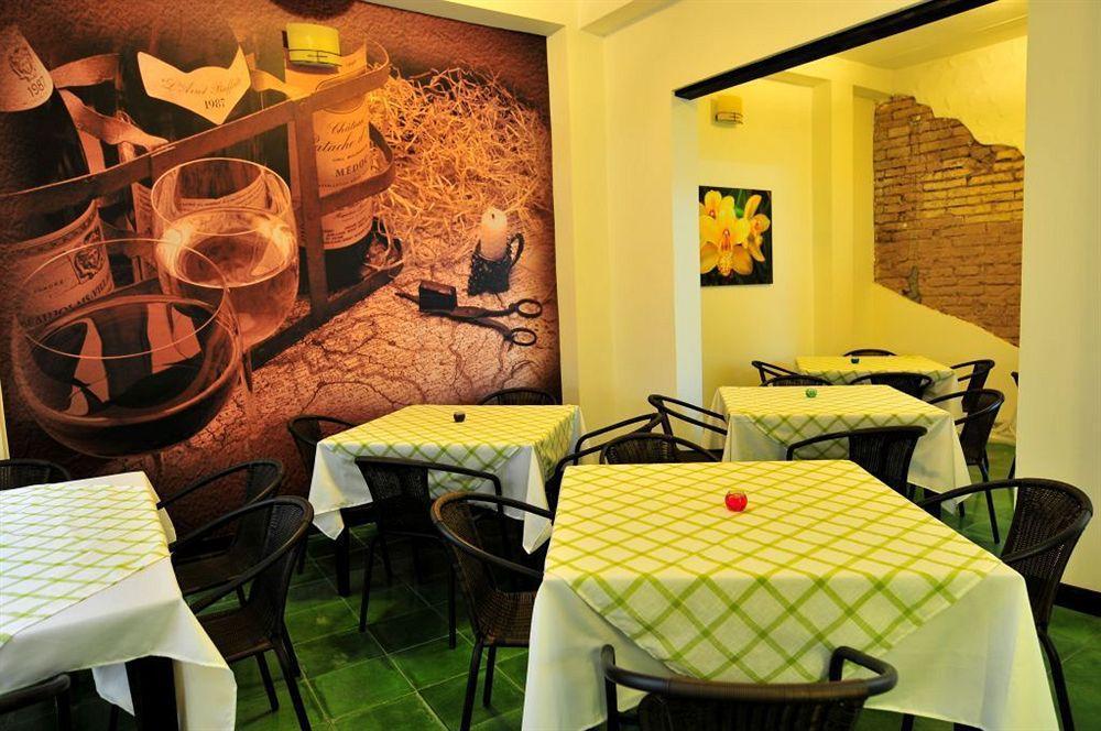 Aw Hotel Puerta De San Antonio Cali Restaurang bild